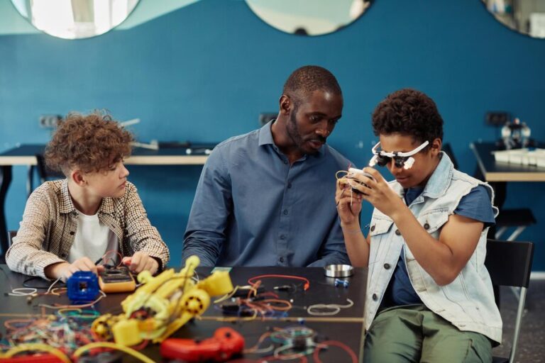 Students building a robotics project